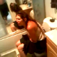 Some guy video-records his girlfriend sitting on a toilet taking a shit. She complains that the shit is full of peppers and is burning her asshole as it slowly slides out of her backside. No audible pooping sounds.